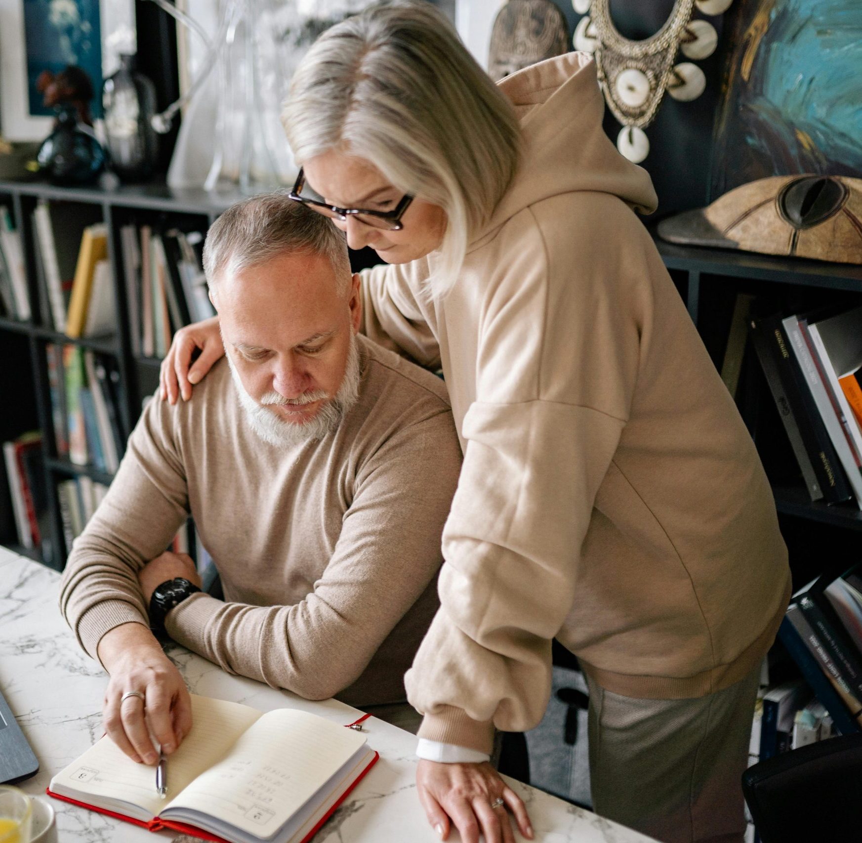 Family discussing long-term security plans around a table