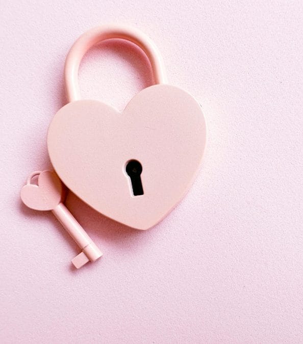 Heart-shaped key unlocking a brain, illustrating how love changes us.