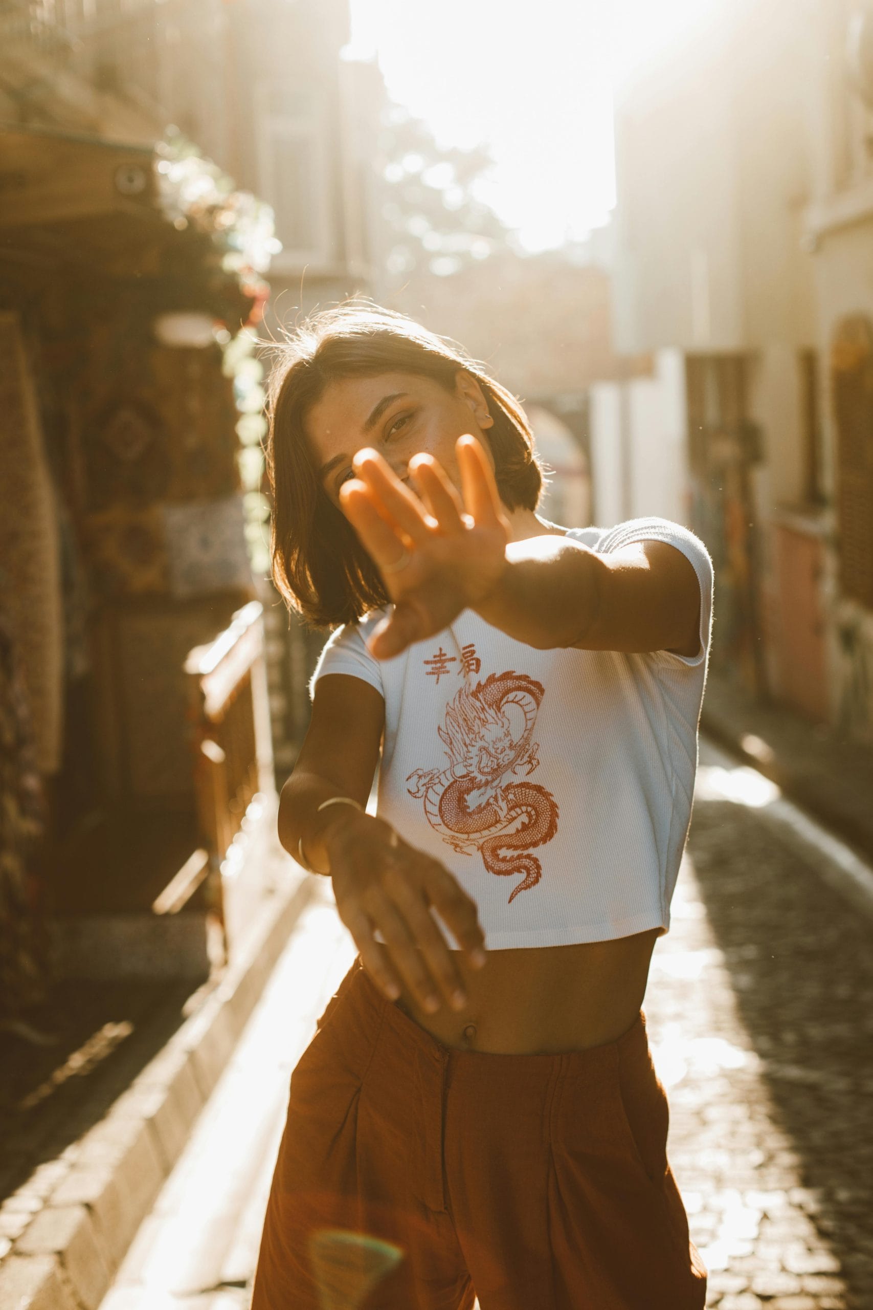 Hands reaching towards light, symbolizing the power of an abundance mindset