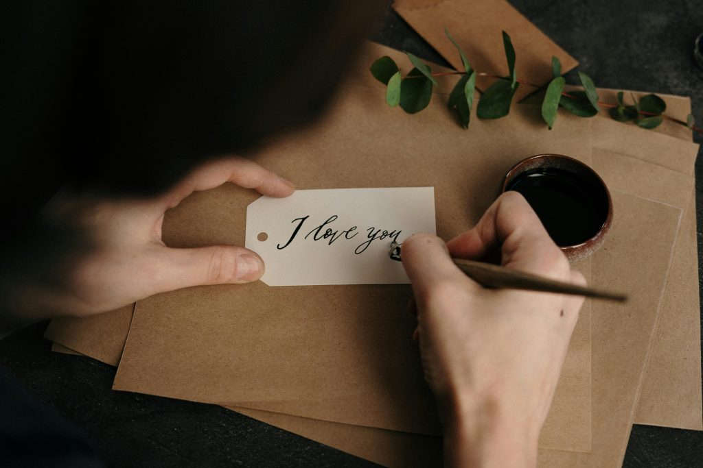 Person holding white printer paper